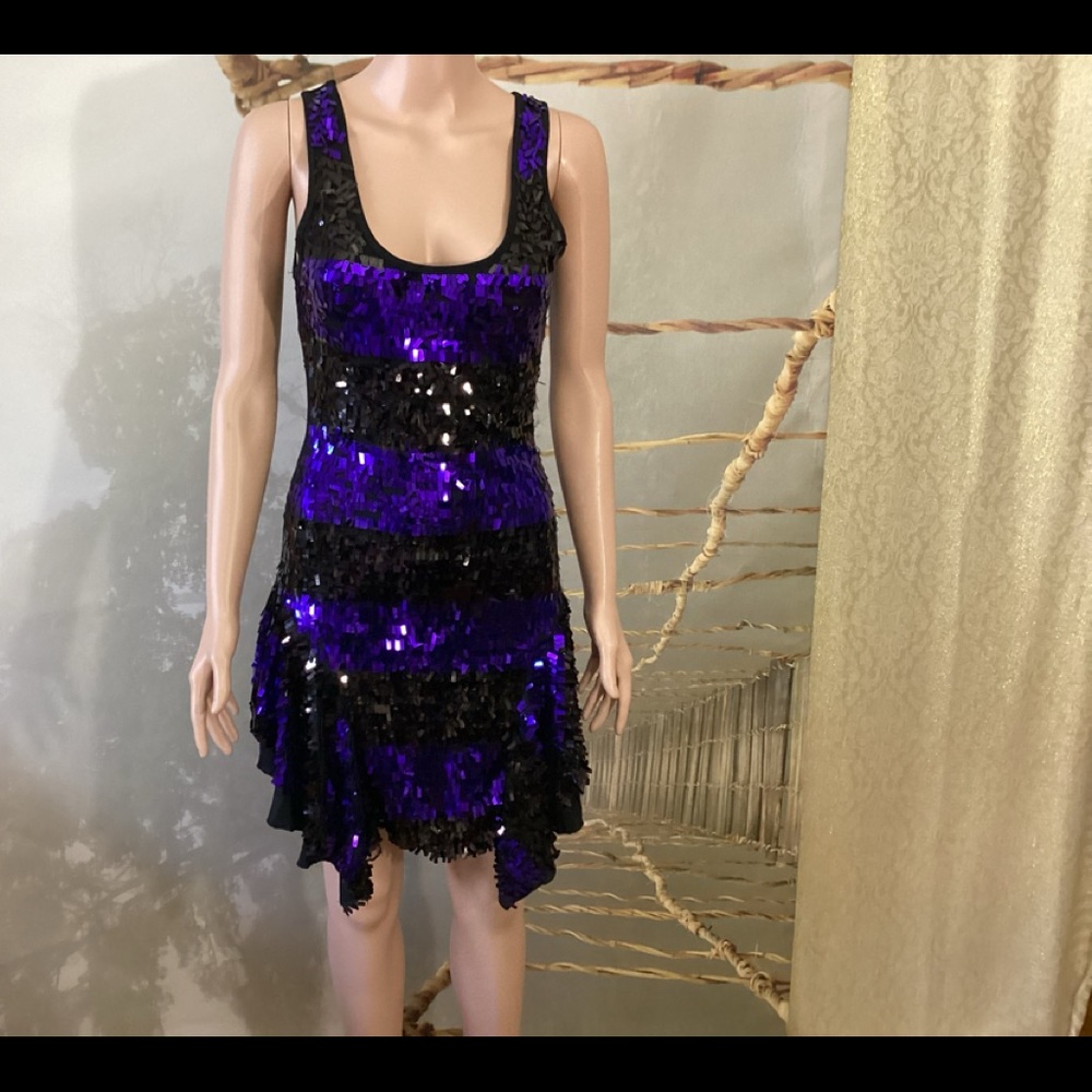Beautiful fun party dress, in sequins, black and purple.